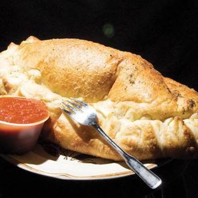 Our Orgasmic Calzone Created by Our Chef From Naples Italy.